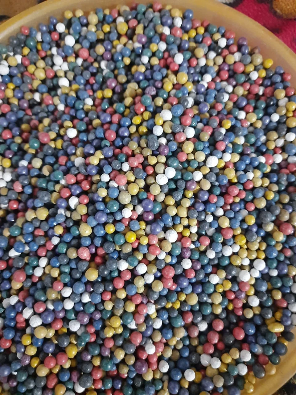 Multi-colour fertilizer granules supplied by Apar